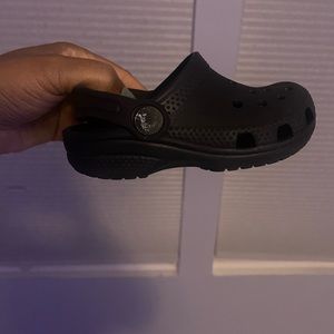 Size 7 black crocs for kids.